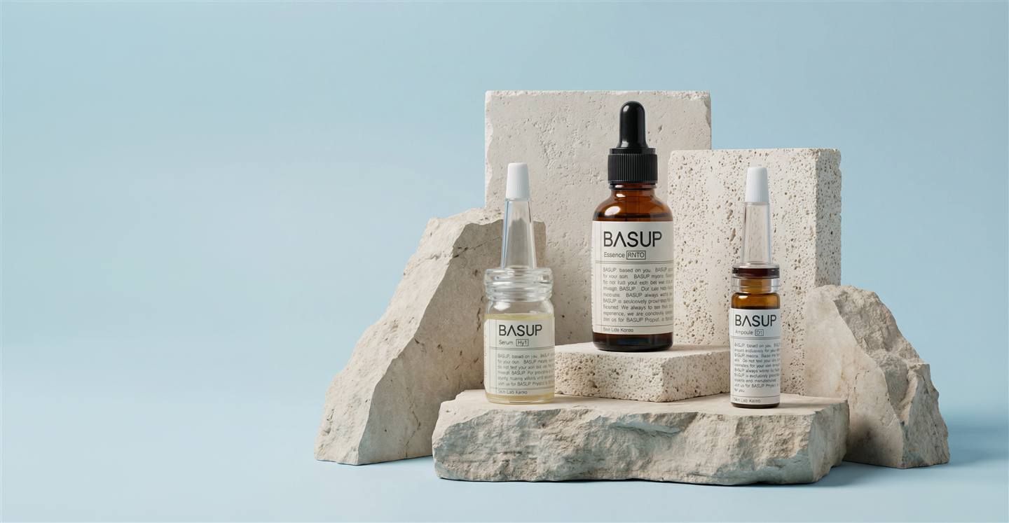 Basup essence, serum, and ampoule on stone